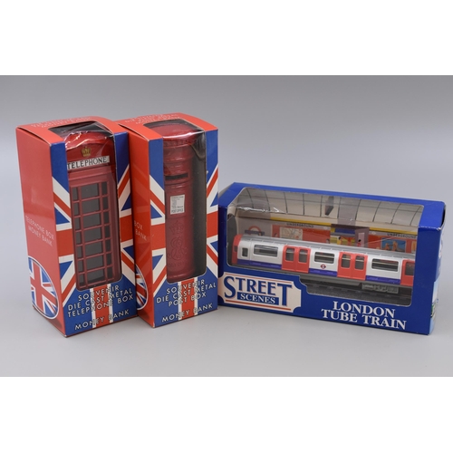 185 - Three Collectable Boxed London Themed Items to include London Tube Train, Red Die Cast Telephone Box... 