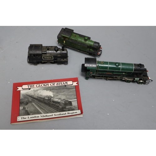 554 - Selection of 4 model train engines and trucks with some other items