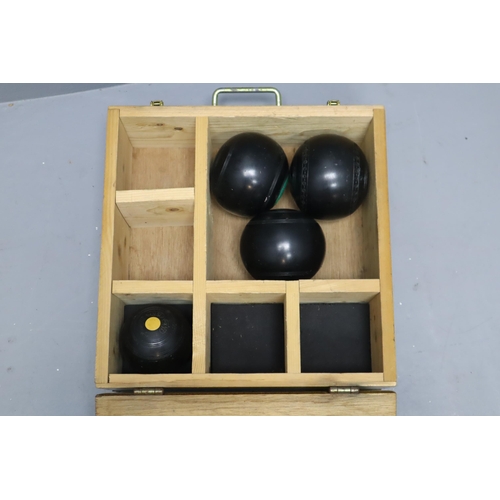 709 - Three Crown Green Bowls and Jack, In Wooden Eastleigh Bowling Club Case. Includes Thomas Taylor