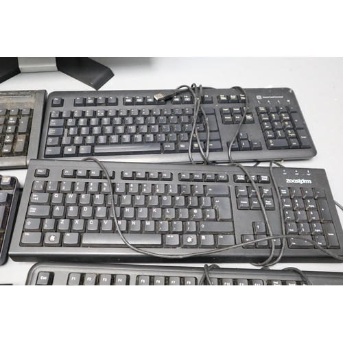 824 - Dell Monitor (Powers On) and Seven USB Keyboards