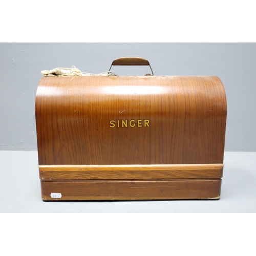 838 - Vintage Singer 128k Hand Cranked Sewing Machine in Wooden Storage Case serial number EM878180 comple... 