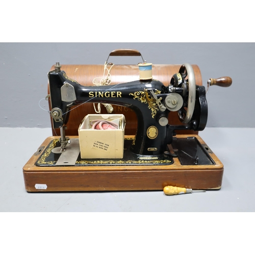 838 - Vintage Singer 128k Hand Cranked Sewing Machine in Wooden Storage Case serial number EM878180 comple... 