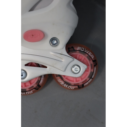 741 - Pink and white medium Power rollerskates size 2-4 UK