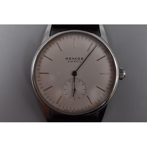 39 - A Nomos Glashutte Gents Automatic Watch (21407) With Champagne and Silver Face, And Original Box. In... 