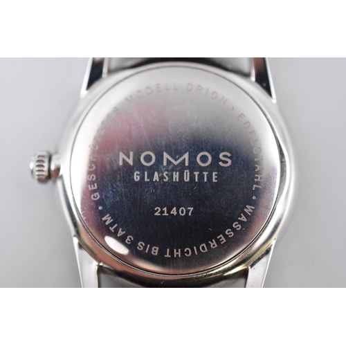 39 - A Nomos Glashutte Gents Automatic Watch (21407) With Champagne and Silver Face, And Original Box. In... 