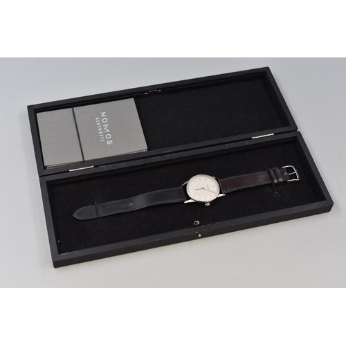 39 - A Nomos Glashutte Gents Automatic Watch (21407) With Champagne and Silver Face, And Original Box. In... 