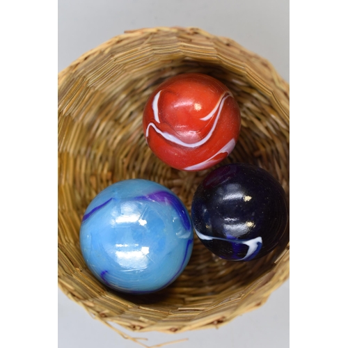 256 - Three Bollies in a Basket and two small eteched Glass Items