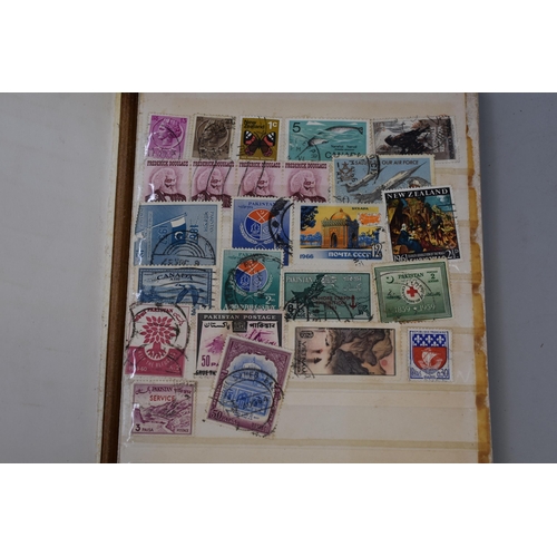 457 - An Album of Various Vintage Worldwide Stamps. Includes Spain, Czechoslovakia, Hong Kong, New Zealand... 