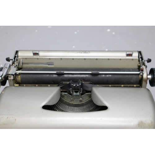 834 - Remington Quiet-Riter Portable Typewriter