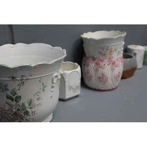 857 - A Selection of Nine Planters And a Ceramic Watering Can To Include Set of Three Graduating Floral Pl... 