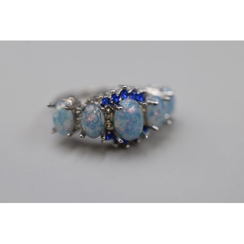 41 - An Opal and Blue Stoned 925. Silver Ring, In Presentation Box