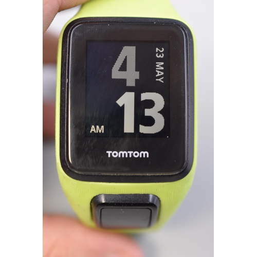 57 - A Tomtom Runner GPS Watch, With Charger. Untested