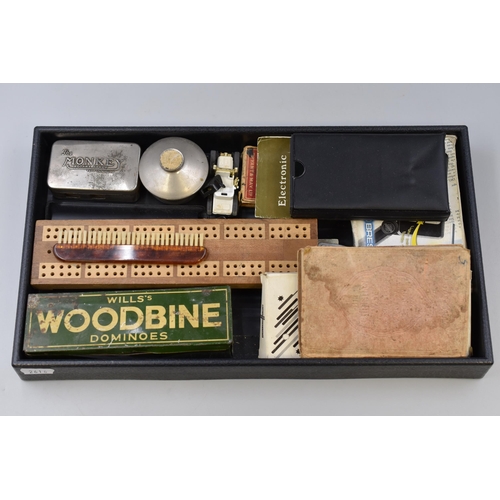 87 - Collection of items to include, Wills's woodbine dominoes, The Monkey rotary strop, vintage calculat... 