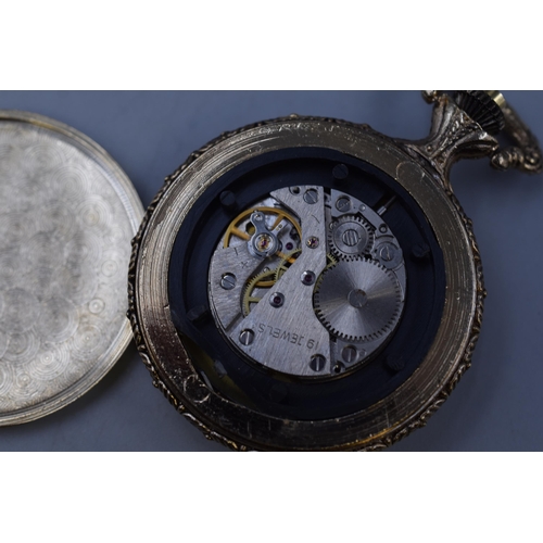 91 - Two Mechanical Pocket Watches, Depicts A Train and A Fisherman. Both in Working Order