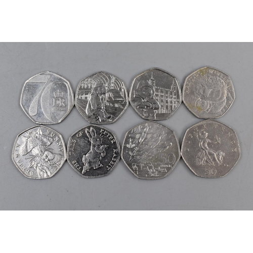 130 - Selection of 8 Collectable 50p Coins including Peter Rabbit, Paddington Bear and More