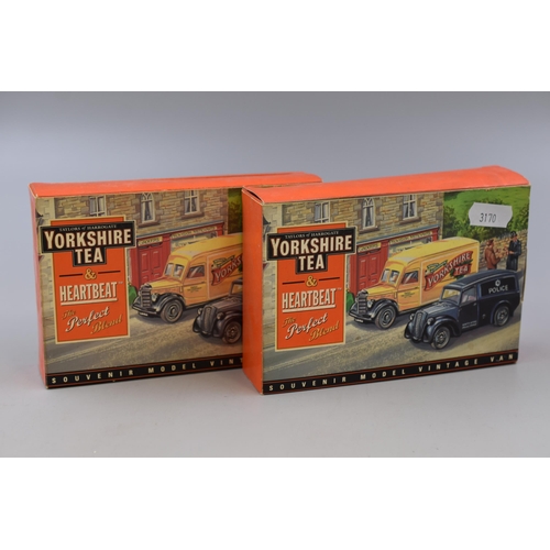 155 - Two diecast Yorkshire Tea & heartbeat cars to include Yorkshire tea van and Police car