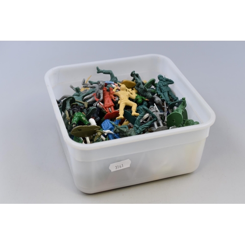 186 - A box full of mixed toy soldiers