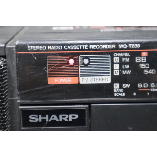 546 - A Sharpe WQ-T238 Stereo Radio Cassette Recorder, Powers On When Tested