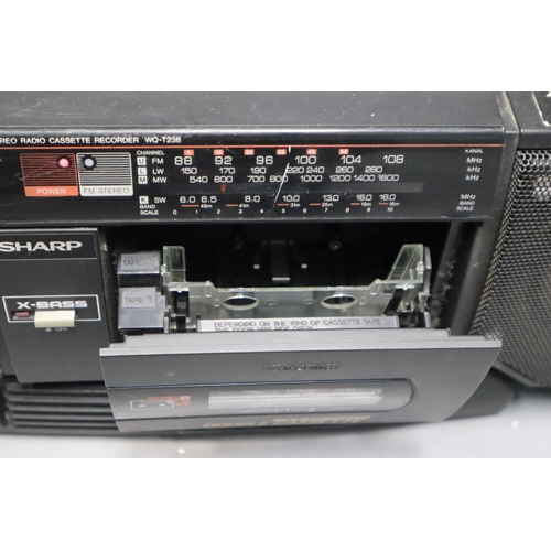 546 - A Sharpe WQ-T238 Stereo Radio Cassette Recorder, Powers On When Tested