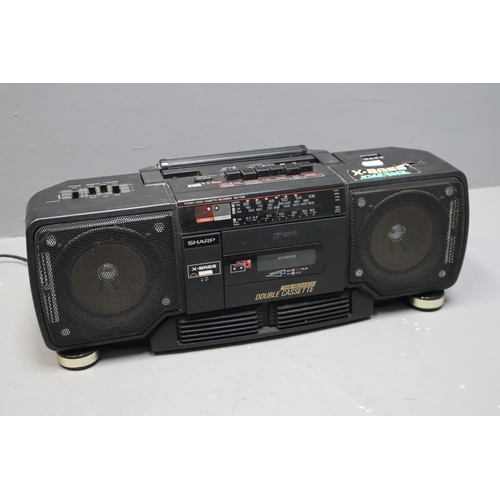 546 - A Sharpe WQ-T238 Stereo Radio Cassette Recorder, Powers On When Tested