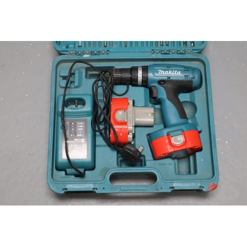 703 - MAKITA 8390D Cordless Drill with 2 Battery Packs, Charger and Drill Bits