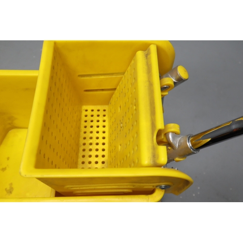 709 - Mop bucket with ringer on wheels