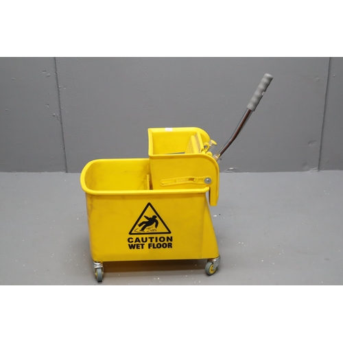 709 - Mop bucket with ringer on wheels