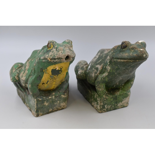 718 - Two ornamental garden frogs (7.5