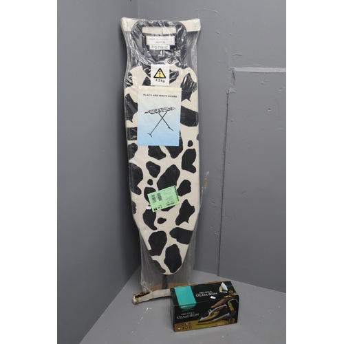 677 - A Black and White Cow Print Ironing Board, With A BergStrom Pro Gold Steam Iron (Untested As Sealed/... 