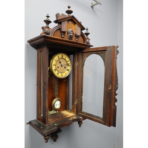 647 - Vintage pendulum wall clock in dark wood 33