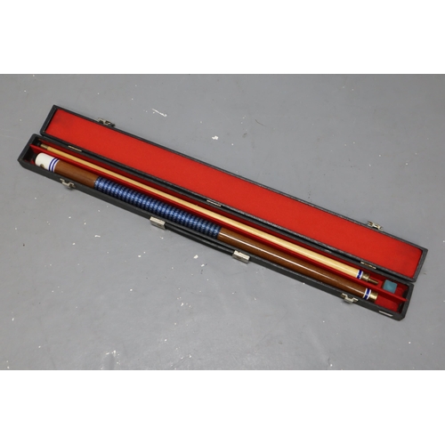 687 - Two piece snooker cue completed in carry case (case is a/f)