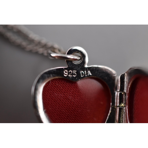 57 - Silver 925 3 necklaces to include Saint Christopher pendant, Heart locket pendant and A heart shaped... 