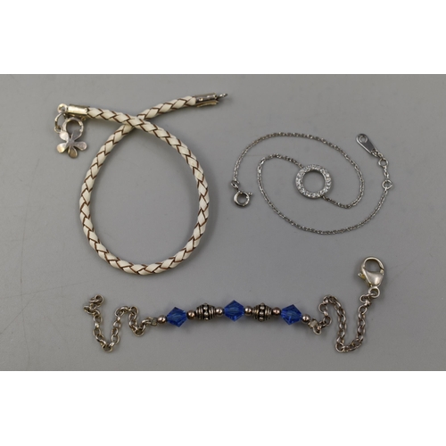 61 - Selection of Three Bracelets to Include One Braided Style Bracelet with Silver Clasp & Two Silve... 