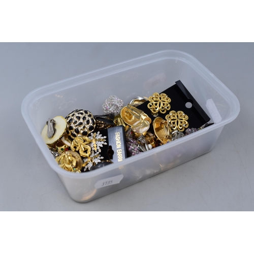 112 - Box full of clip on earrings (some a/f)