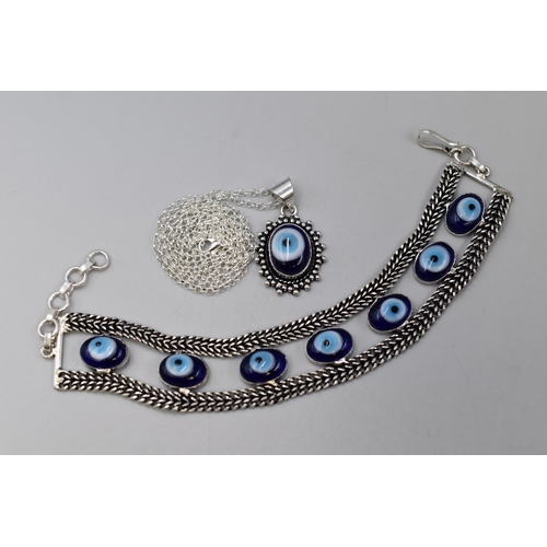 260 - Two Pieces of Evil Eye Jewellery To Include 925. Silver Pendant Necklace, And Evil Eye Bracelet in P... 