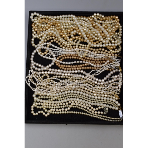 265 - Two trays of Approx 30 vintage pearl styled necklaces and bracelets