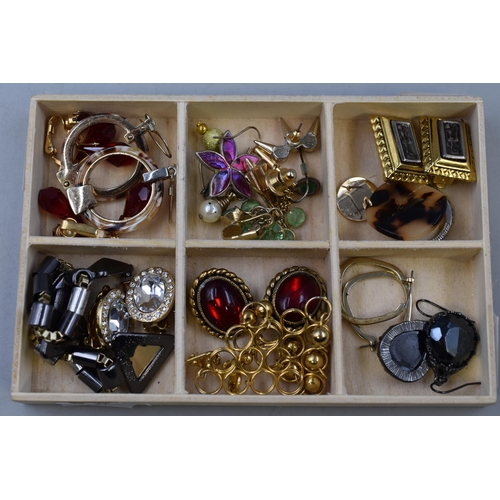 280 - A selection of earrings to include: Ruby styled clip on earrings and more