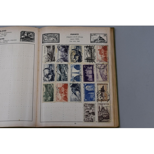 162 - Improved Album Containing a Selection of Worldwide Postage Stamps, Mint Sets and More