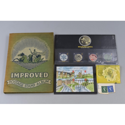 162 - Improved Album Containing a Selection of Worldwide Postage Stamps, Mint Sets and More