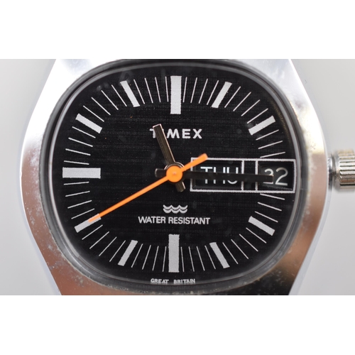 204 - A Timex Mechanical Water Resistant Day/Time Watch, In Working Order