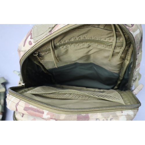 773 - Two Military Camo Backpacks. Includes Kombat Tactical, And Other