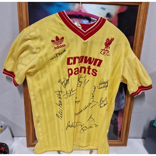 249 - Signed LFC Football Shirt. Has Various Signatures . Includes Ian Rush and Peter Beardsley