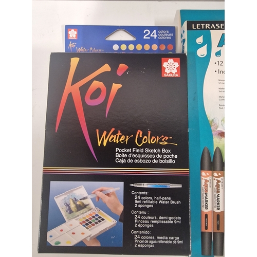 585 - Sakura Koi 24 Colour Pocket / Field Sketch Box and a Pack of 12 Letraset Aqua Markers