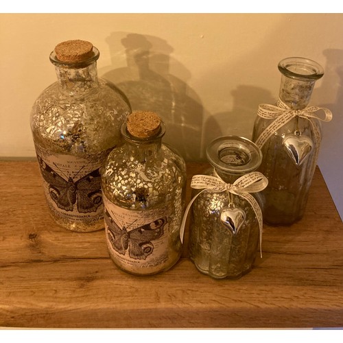 404 - Four decorative glass bottles 2 with butterfly design tallest 8