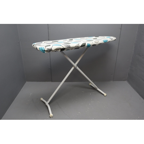 672 - Ironing board and clothes maiden