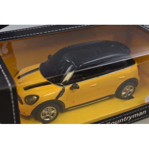 424 - Collection of Three R/C Cars to Include' Rastar Mini Cooper S Countryman and Two Street Racers Outla... 