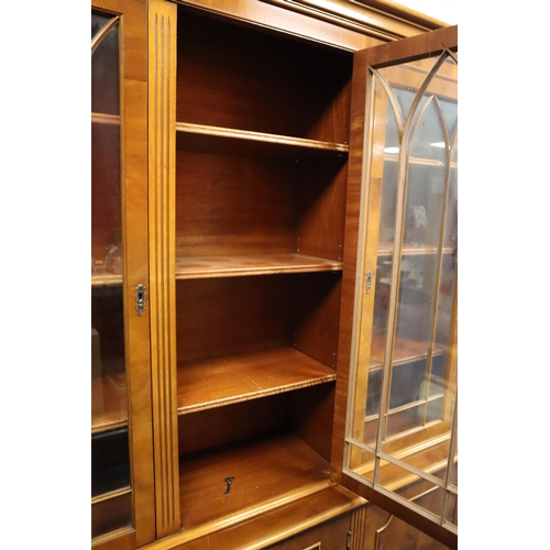 690 - Vintage teak display cabinet with two glass filled doors comprising of 9 shelves on the top and a bo... 