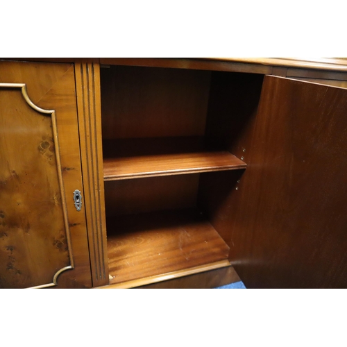 690 - Vintage teak display cabinet with two glass filled doors comprising of 9 shelves on the top and a bo... 