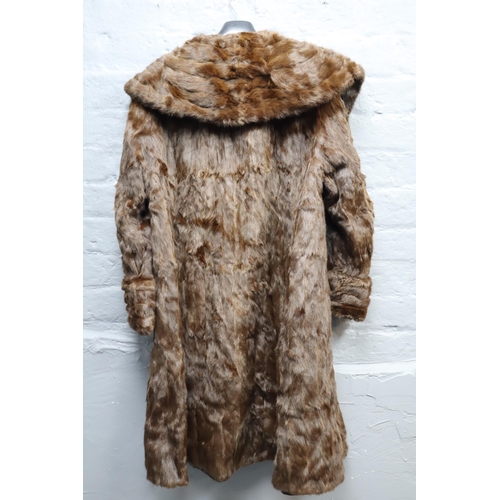 712 - A job lot of 4 mid century of real fur coats, two short and two long, one real sheep skin