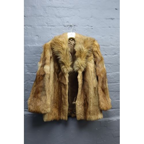 712 - A job lot of 4 mid century of real fur coats, two short and two long, one real sheep skin